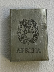 WWII GERMAN MATCH COVER WITH AFRIKA ENGRAVED