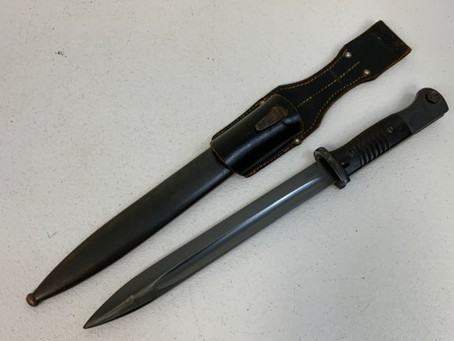 WWII GERMAN COMBAT BAYONET RICH A. HERDER MATCHING NUMBERS: WWII GERMAN COMBAT BAYONET RICH A. HERDER WITH MATCHING NUMBERS. VERY GOOD CONDITION WITH NICE ORIGINAL BLUING ON THE BLADE. 2391 NUMBER STAMPED ON THE BLADE AND SCABBARD. COMES WITH COMBAT LEATHER FR