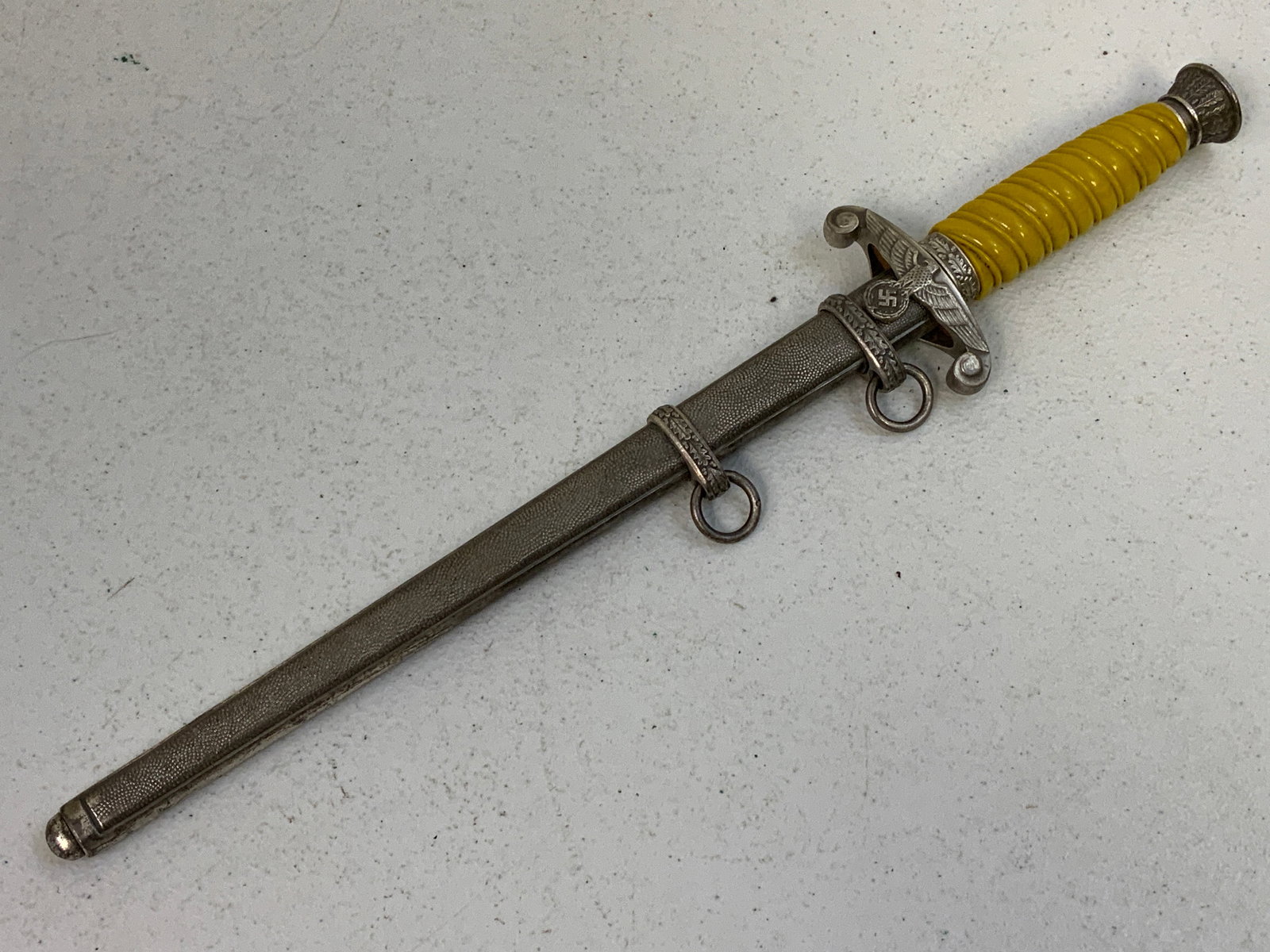 WWII GERMAN ARMY OFFICER DRESS DAGGER F.W.HOLLER: WWII GERMAN ARMY OFFICER DRESS DAGGER.VERY GOOD OVERALL CONDITION DAGGER. F.W.HOLLER MARKED BLADE.