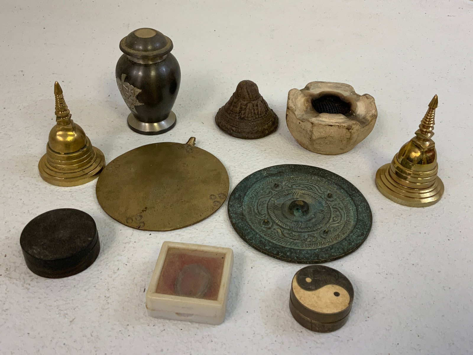 ANTIQUE BUDDHIST NEPALESE MELONG MIRRORS BUDDHIST RELIQUARIES: ANTIQUE BUDDHIST NEPALESE MELONG MIRRORS BUDDHIST RELIQUARIES VARIOUS AGES. NICE LOT. FROM DR. PAUL D LYNN COLLECTION.