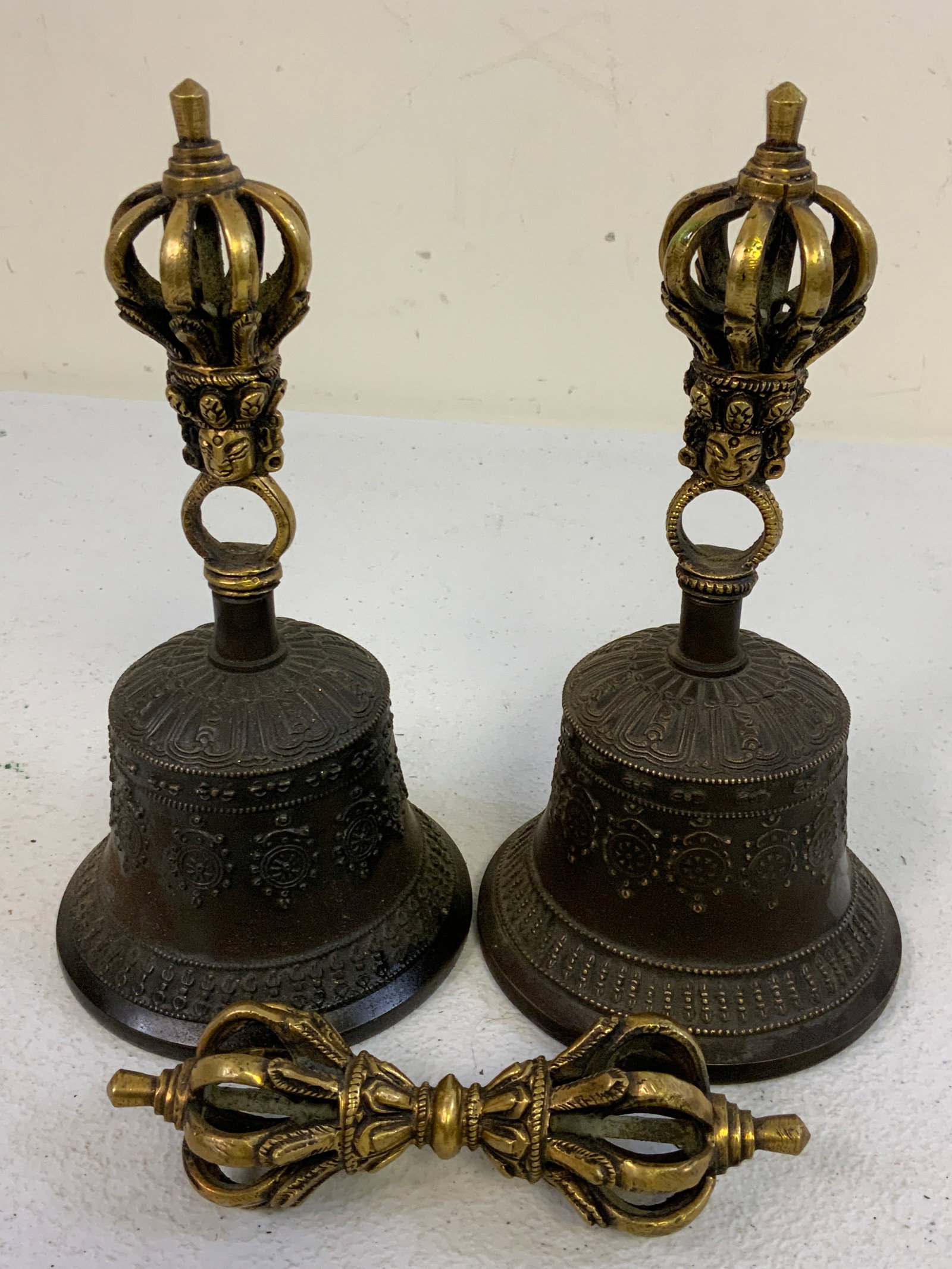 ANTIQUE BUDDHIST NEPALESE NYINGMA BELLS AND RITUAL VAJRA: ANTIQUE BUDDHIST NEPALESE NYINGMA BELLS AND RITUAL VAJRA. BELLS 7" LOND , 3 3/4" DIAMETER. FROM DR. PAUL D LYNN COLLECTION.