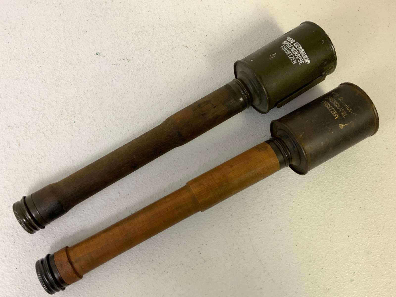 WWI GERMAN STICK GRENADES INERT REPLICA REPRODUCTIONS: WWI GERMAN STICK GRENADES INERT REPLICA REPRODUCTIONS. LOT OF 2. GREAT DISPLAY OR REENACTORS ITEMS.