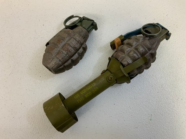 US INERT PINAPPLE GRENADES WITH RIFLE GRENADE ADAPTER REPLICA REPRODUCTIONS: US INERT PINAPPLE GRENADES WITH RIFLE GRENADE ADAPTER REPLICA REPRODUCTIONS. LOT OF 2. GREAT DISPLAY OR REENACTORS ITEMS.