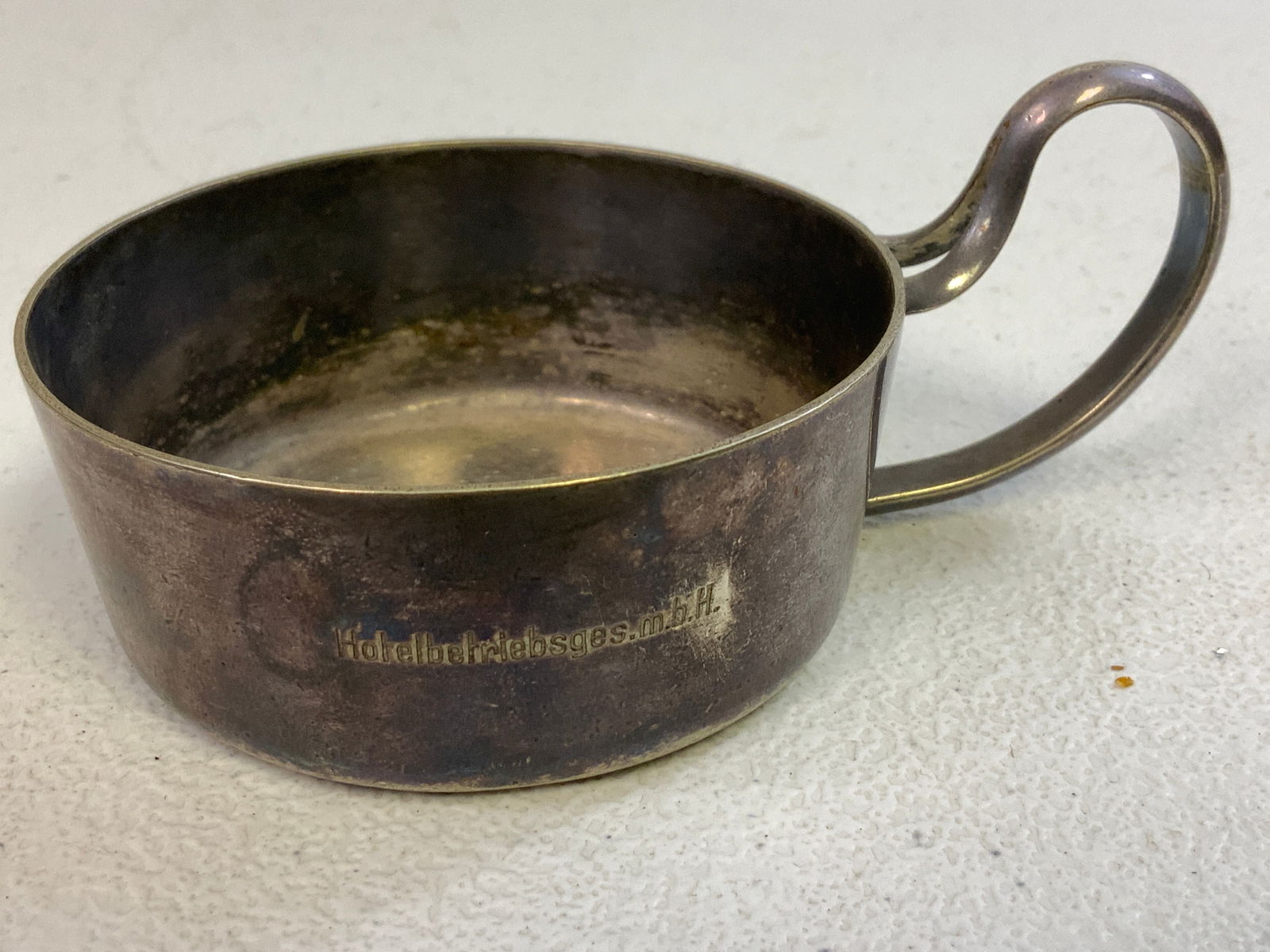 GERMANY THIRD REICH HOTELBETRIEBSGES.M.B.H NSDAP HOTEL SILVER CUP: GERMANY THIRD REICH HOTELBETRIEBSGES.M.B.H NSDAP HOTEL SILVER CUP. Marked GEBR. HEPP 90. Third Reich silver service piece from the most famous hotel in Austria during the Hitler era. Silver service ar