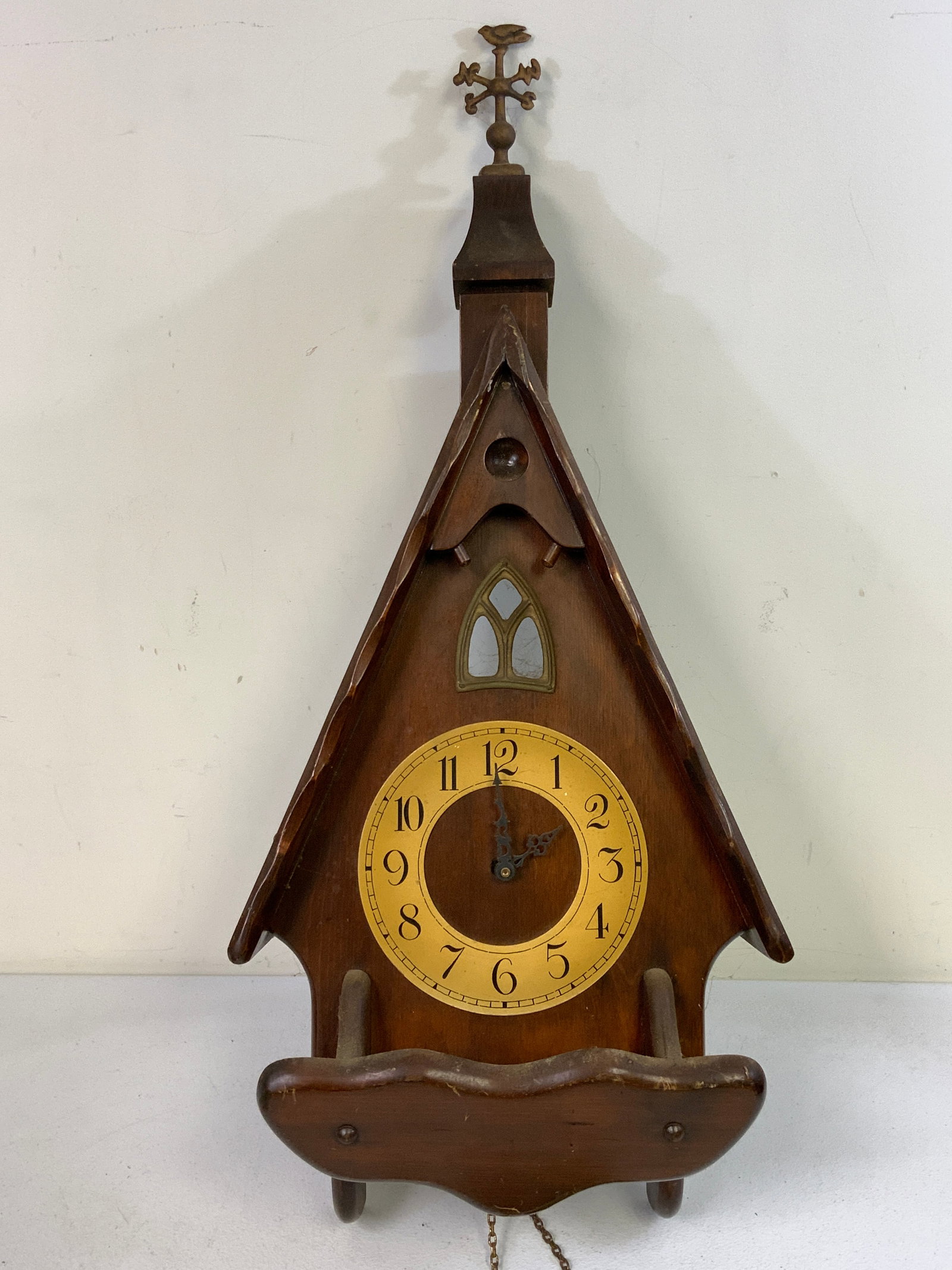 VINTAGE GERMAN BLACK FOREST STYLE WALL CLOCK: VINTAGE GERMAN BLACK FOREST STYLE WALL CLOCK. WORKING CONDITION IS UNKNOWN. 14 X 33 X 6 SIZE. FROM DR. PAUL D. LYNN COLLECTION.