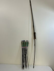 ANTIQUE LONGBOW WITH ARROWS