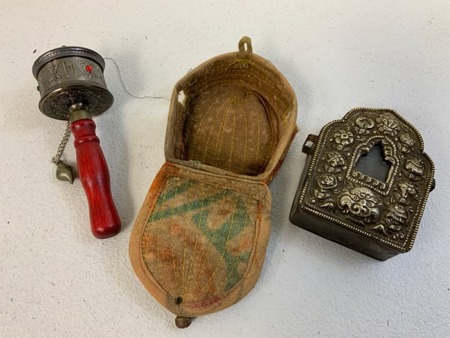 ANTIQUE BUDDHIST PRAYER SHRINE IN CASE AND PRAYER WHEEL: ANTIQUE BUDDHIST PRAYER SHRINE IN CASE AND PRAYER WHEEL. SHRINE DISPLAYS A GREAT AGE AS WELL AS CASE. THE WHEEL IS MORE MODERN. FROM DR. PAUL D LYNN COLLECTION.