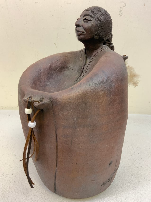 VINTAGE ARTIST SIGNED NATIVE AMERICAN LARGE PURPLE CLAY STATUE: VINTAGE NATIVE AMERICAN PURPLE CLAY STATUE. ARTIST SIGNED. 1987 DATED. 13" TALL.BEAUTIFUL LARGE PIECE. HEAVY. GREAT DECORATOR.