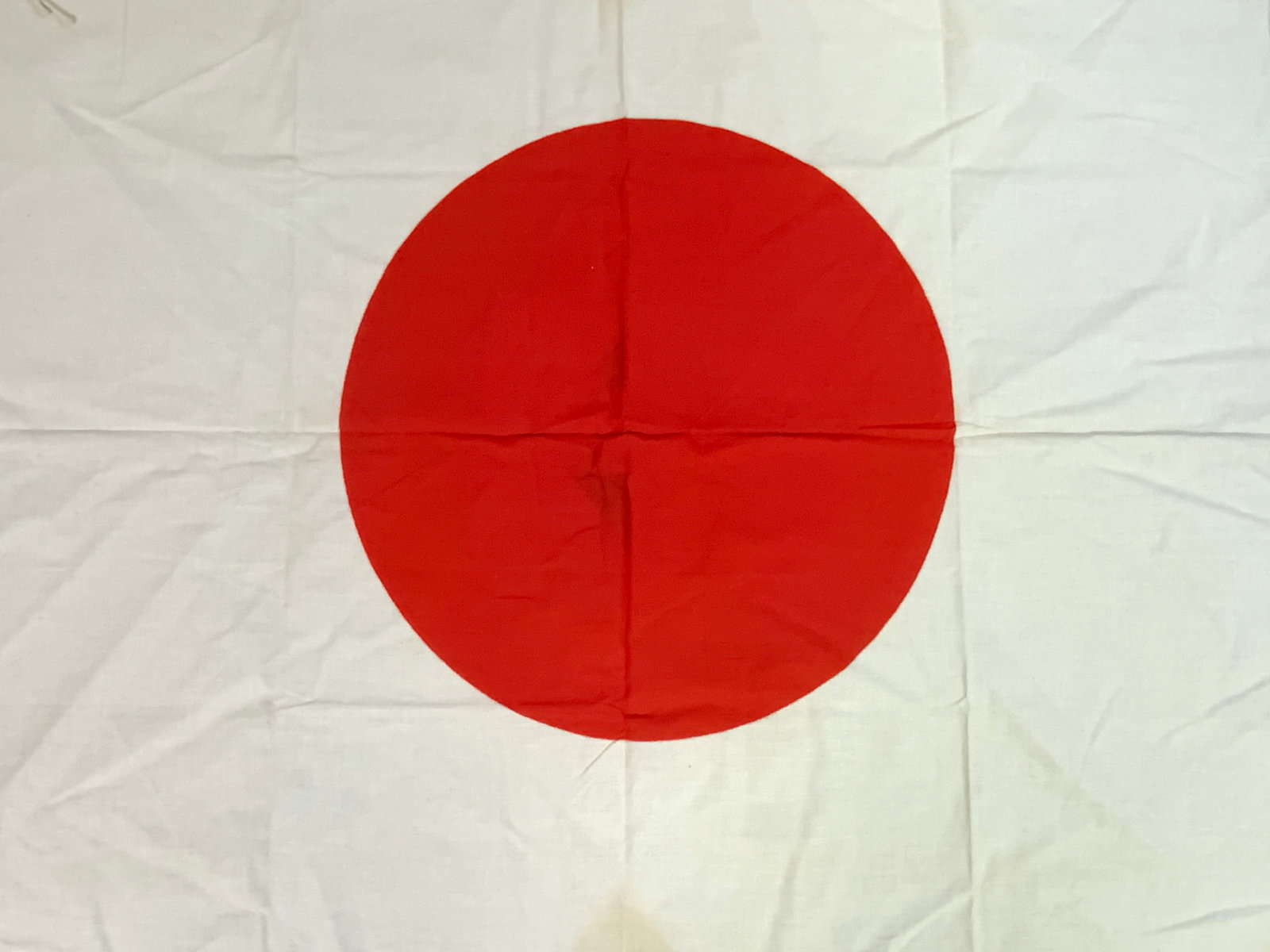 JAPAN WWII JAPANESE FLAG: JAPAN WWII JAPANESE FLAG. COTTON. GREAT CONDITION . ATTACHMENT STRINGS WITH LEATHER REENFORCED CORNERS. 35" X 28" SIZE