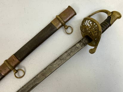 US MODEL 1850 FOOT OFFICER’S SWORD: US MODEL 1850 FOOT OFFICER’S SWORD. ETCHED BLADE. OVERALL GOOD CONDITION. SOME AGE AND DARKENING TO THE BLADE. 38" LONG WITH 31" LONG BLADE.