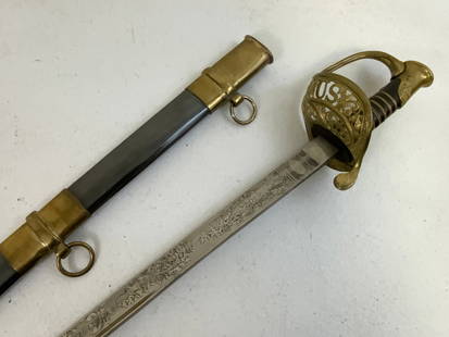 US MODEL 1850 FOOT OFFICER’S SWORD: US MODEL 1850 FOOT OFFICER’S SWORD.HIGH QUALITY REPRODUCTION SWORD. ETCHED BLADE. OVERALL GOOD CONDITION. 40" LONG WITH 31" LONG BLADE.