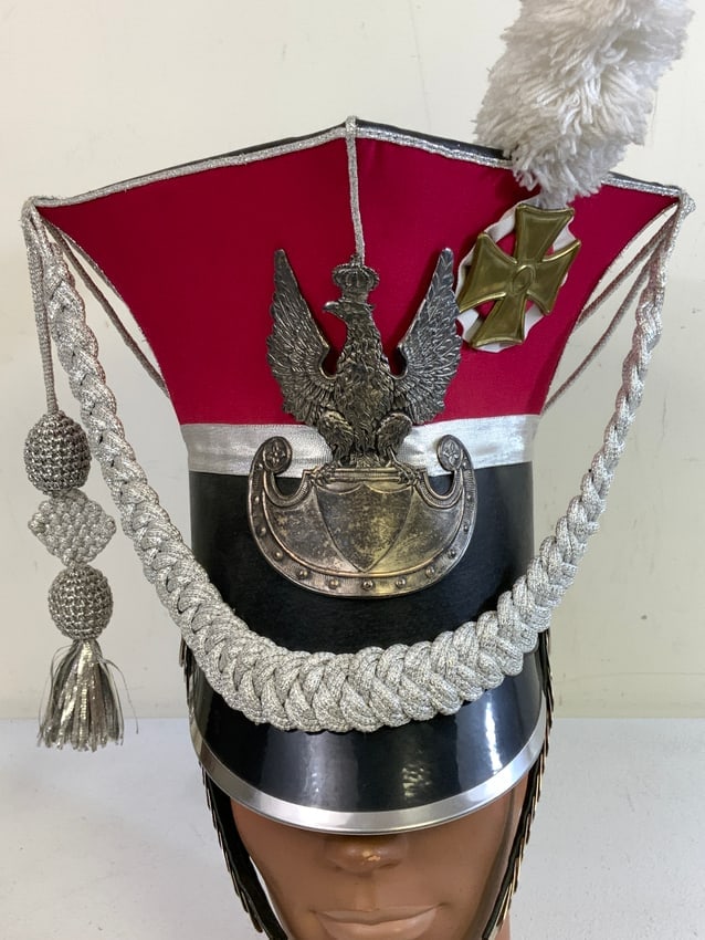 POLISH 1ST UHLAN LANCERS CZAPKA HELMET MUSEUM QUALITY REPLICA: POLISH 1ST UHLAN LANCERS CZAPKA HELMET MUSEUM QUALITY REPLICA. OUTSTANDING EXAMPLE. ORIGINAL POLISH MADE. COMPLETE WITH LINER, CORDS AND CHIN SCALES. LABEL INSIDE WITH SIZE 57