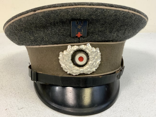 GERMANY THIRD REICH GERMAN RED CROSS (DRK) OTHER RANKS PERSONNEL VISOR CAP. GOOD CONDITION HAT: GERMANY THIRD REICH GERMAN RED CROSS (DRK) OTHER RANKS PERSONNEL VISOR CAP. GOOD CONDITION HAT. SOME HOLES AND TEARE INSIDE LINING. OTHERWISE GREAT EXAMPLE.