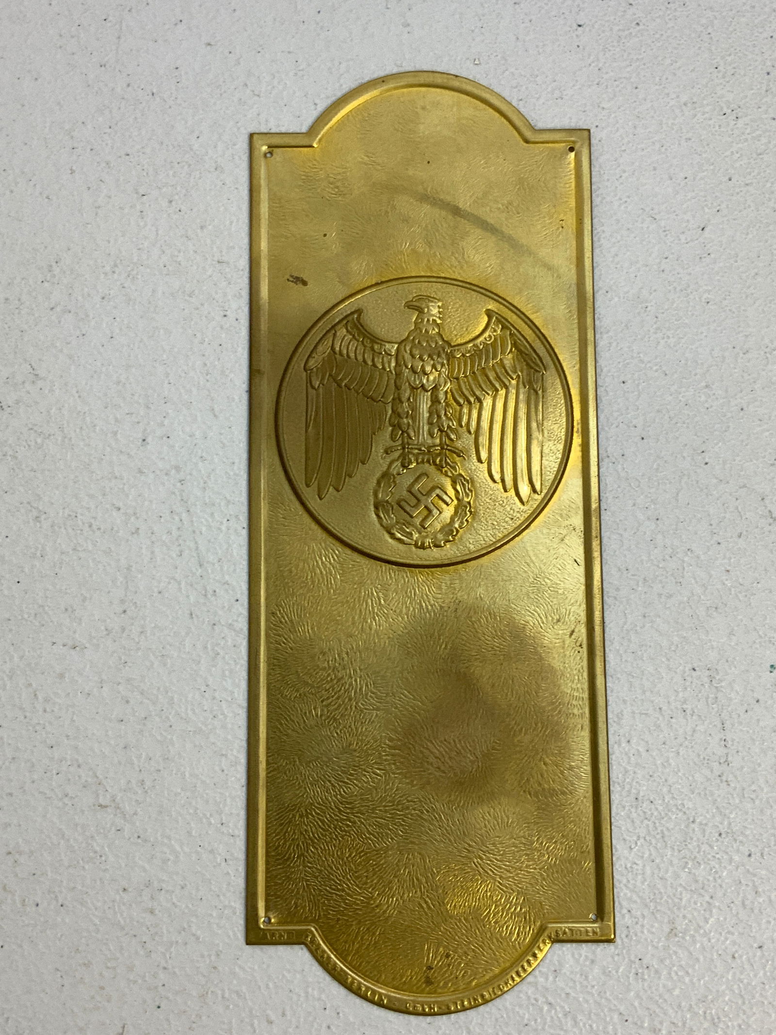 GERMANY THIRD REICH BRASS DOOR FINGER PLATE BERLIN MAKER MARKED: GERMANY THIRD REICH BRASS DOOR FINGER PLATE. GREAT CONDITION. 4 MOUNTING HOLES. BERLIN MAKER MARKED. 3 3/4 X 10 SIZE .