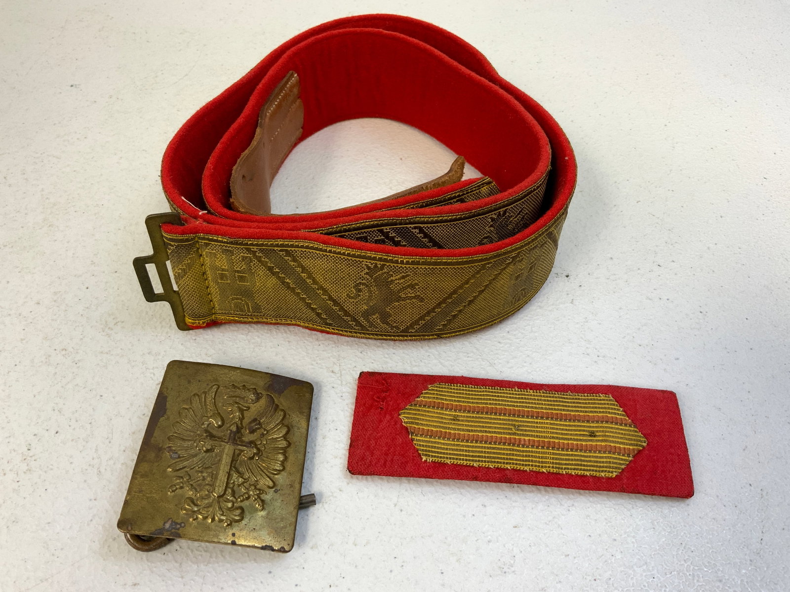 SPAIN SPANISH WWII BROCADE BELT , BUCLE AND PATCH: SPAIN SPANISH WWII BROCADE BELT , BUCLE AND PATCH. OFFICERS BROCADE BELT IN GREAT CONDITION AND NAMED. EM/NCO BELT BUCKLE AND A PATCH .