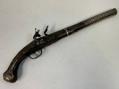 ANTIQUE OTTOMAN TURKEY 18th CENTURY FLINTLOCK PISTOL SILVER DECORATED GUN: ANTIQUE OTTOMAN TURKEY 18th CENTURY FLINTLOCK PISTOL SILVER DECORATED GUN. OVERALL STILL GOOD CONDITION FOR ITS AGE. SILVER DECORATIVE INLAYS AND FITTINGS. STEEL BARREL WITH REMNANTS OF MARKINGS ON TO