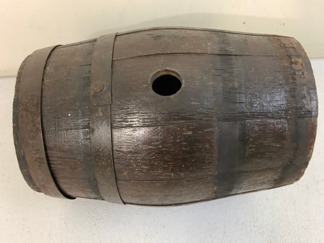 ANTIQUE GUN POWDER KEG: ANTIQUE GUN POWDER KEG . 18TH-EARLY 19TH CENTURY. IRON BANDED. GOOD CONDITION FOR ITS AGE. 10 1/2 LONG. APPROX. 7" DIAM.