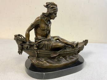 DUCHOISELLE SIGNED  "INDIAN BRAVE IN A CANOE" BRONZE STATUE