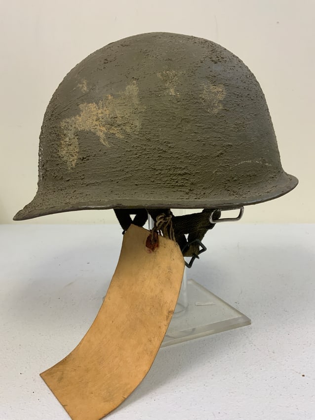 WWII PARATROOPER US M1 AIRBORNE STEEL HELMET WITH LINER: WWII PARATROOPER US M1 STEEL HELMET WITH LINER. LATE WAR EXAMPLE. TEXTURED CAMO PAINTED METAL HELMET . WESTINGHOUSE PARATROOPER LINER . WELL USED BUT STILL GOOD CONDITION. NAME INSIDE. OLD PAPER TAG W