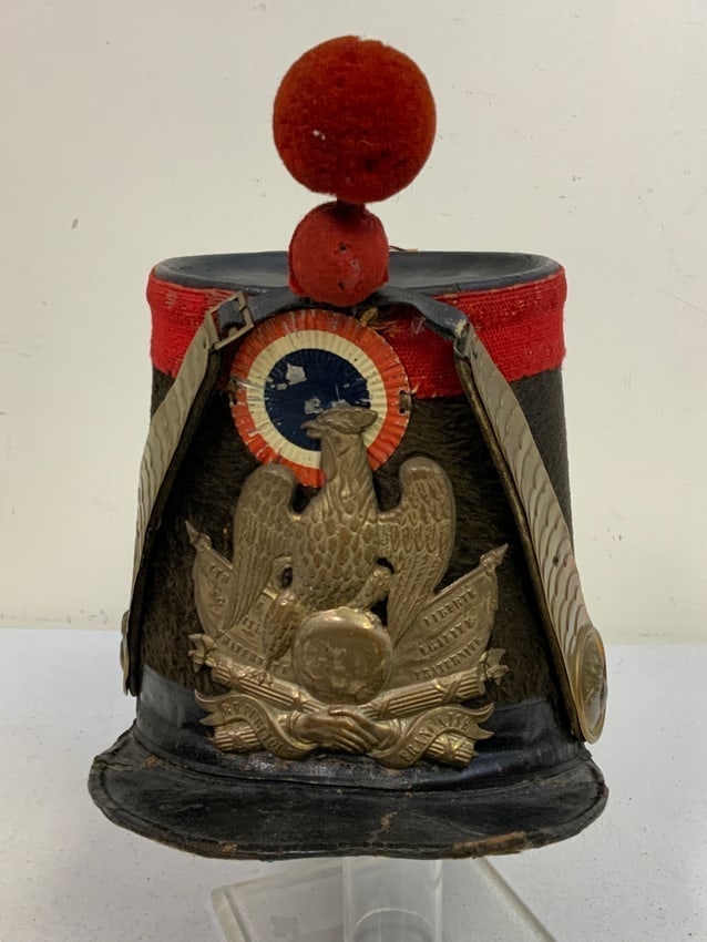 ANTIQUE FRENCH 1840'S-50'S MILITARY INFANTRY SHAKO: ANTIQUE FRENCH 1840'S-50'S MILITARY INFANTRY SHAKO . WELL WORN CONDITION BUT GOOD FOR ITS AGE. SOME CRACKS TO THE VISOR. GREAT DISPLAY PIECE AND COMPLETE.