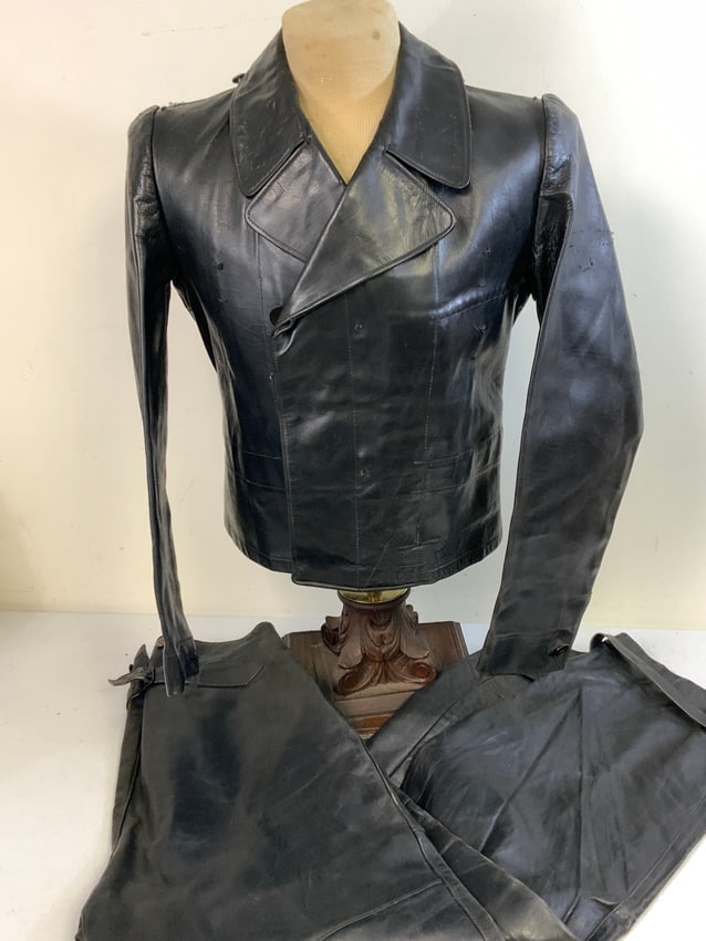 WWII GERMAN WAFFEN SS PANZER LEATHER JACKET AND TROUSERS EX KRIEGSMARINE: WWII GERMAN WAFFEN SS PANZER LEATHER JACKET AND TROUSERS. VERY RARE AND RARELY SEEN LATE WAR SS PANZER USED UNIFORM. ORIGINALLY KRIEGSMARINE ISSUE LEATHER REPURPOSED FOR SS TANK CREWS IN THE LATE WAR