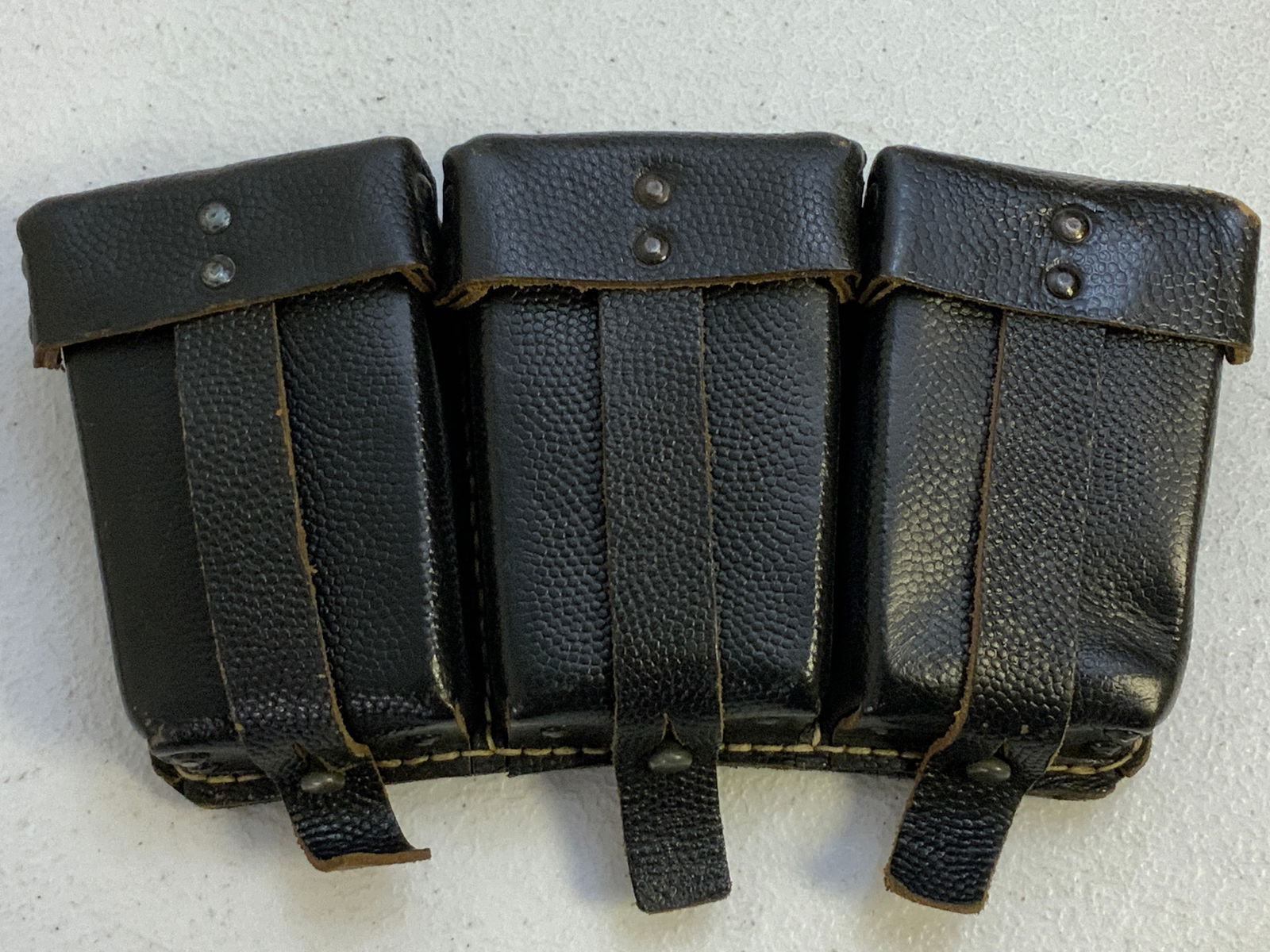 WWII GERMAN MILITARY K 98 AMMUNITION POUCH BLACK LEATHER: WWII GERMAN MILITARY K 98 AMMUNITION POUCH BLACK LEATHER. GREAT CONDITION. STAMPED WITH RBN NUMBER.