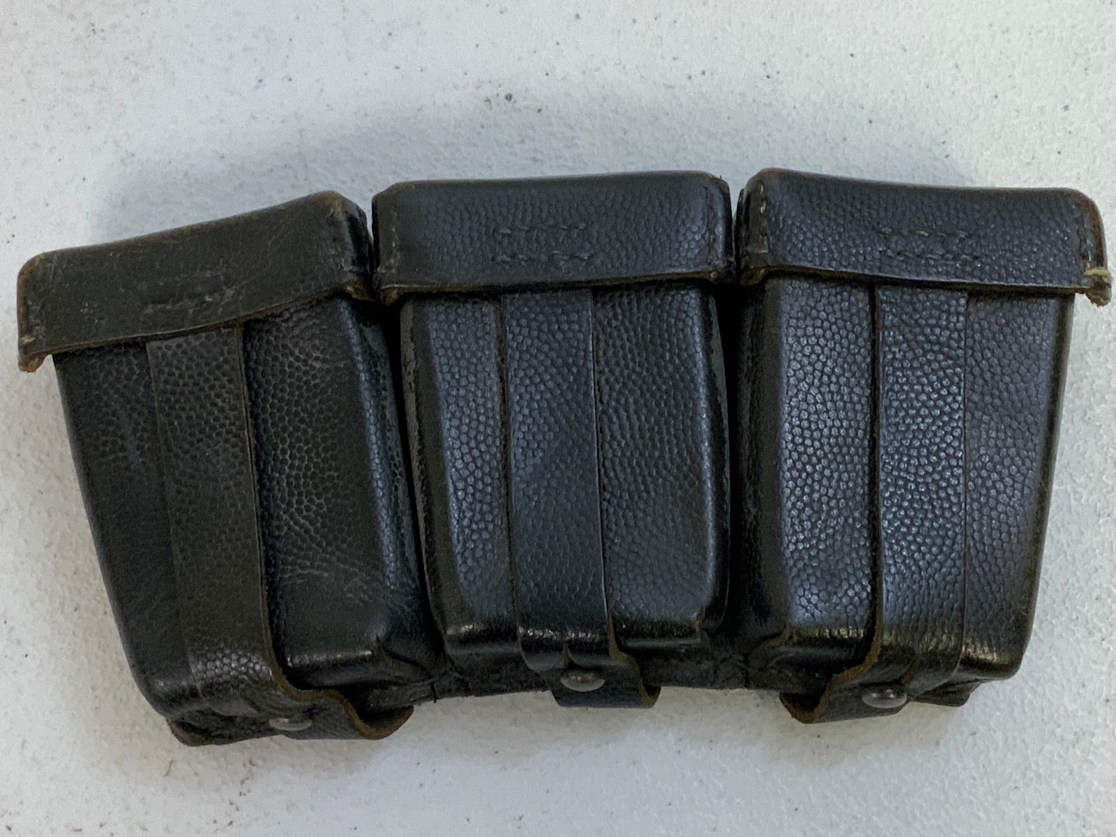 WWII GERMAN MILITARY K 98 AMMUNITION POUCH BLACK LEATHER: WWII GERMAN MILITARY K 98 AMMUNITION POUCH BLACK LEATHER. GREAT CONDITION. STAMPED WITH RBN NUMBER.