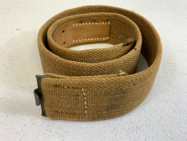 WWII GERMAN AFRIKA KORPS WEHRMACHT TROPICAL WEB BELT: AFRIKA KORPS WEHRMACHT TROPICAL WEB BELT. MINT LIKELY NEVER ISSUED CONDITION BELT. INK STAMPED WITH SIZE AND MANUFACTURE LOGO. RARE .