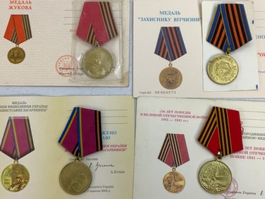 UKRAINE LOT OF 4 MEDALS WITH AWARD PAPERS