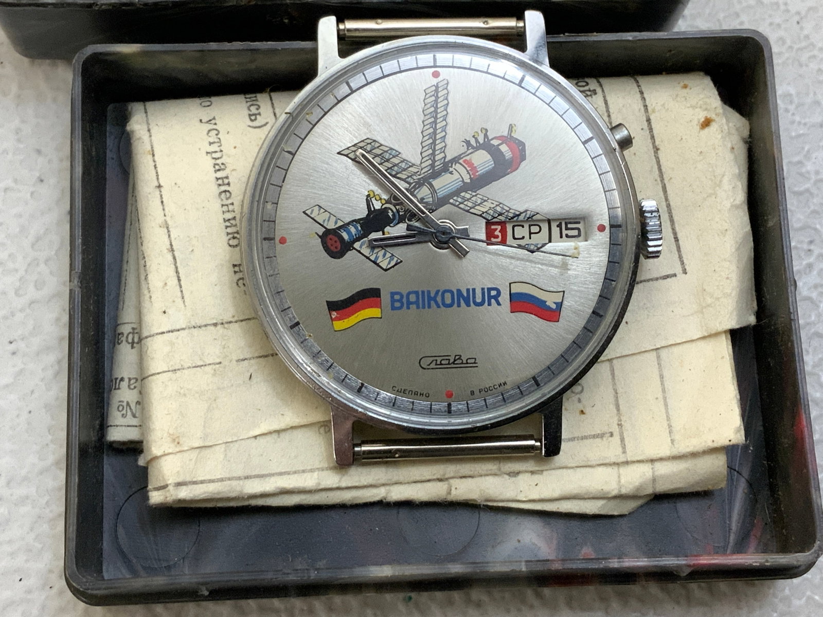 RUSSIA SLAVA BAIKONUR SPACE AUTOMATIC WATCH: RUSSIA SLAVA BAIKONUR SPACE AUTOMATIC WATCH/ APPEARS TO BE IN NEVER USED CONDITIO AND WORKING GREAT. COMES WITH ORIGINAL BOX , MANUAL AND PAPERS.