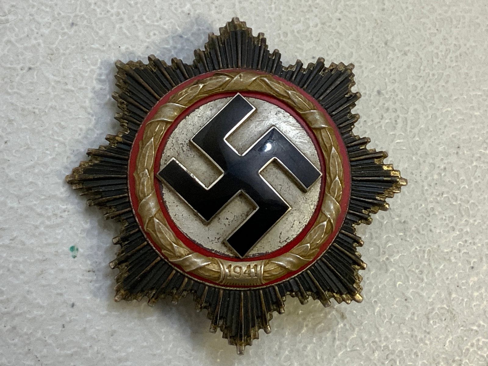 GERMANY THIRD REICH WWII 1941 GERMAN CROSS IN SILVER: GERMANY THIRD REICH WWII 1941 GERMAN CROSS IN SILVER. VERY NICE ENAMEL AND GOOD CONDITION OVERALL. SOME WEAR AND AGE DARKENING.5 RIVET CONSTRUCTION. NUMBER 2 MARK ON THE PIN.