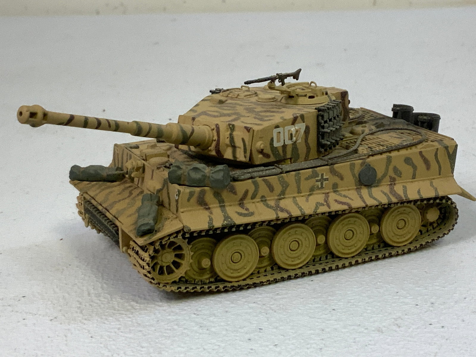 WWII GERMAN TIGER 1 TANK DIE CAST MODEL CUSTOM DETAILED: WWII GERMAN TIGER 1 TANK DIE CAST MODEL CUSTOM DETAILED . 5" LONG BODY. 3" WIDE.