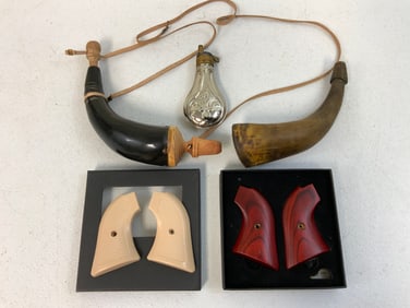 LOT OF POWDER HORNS FLASKS AND REVOLVER GRIPS