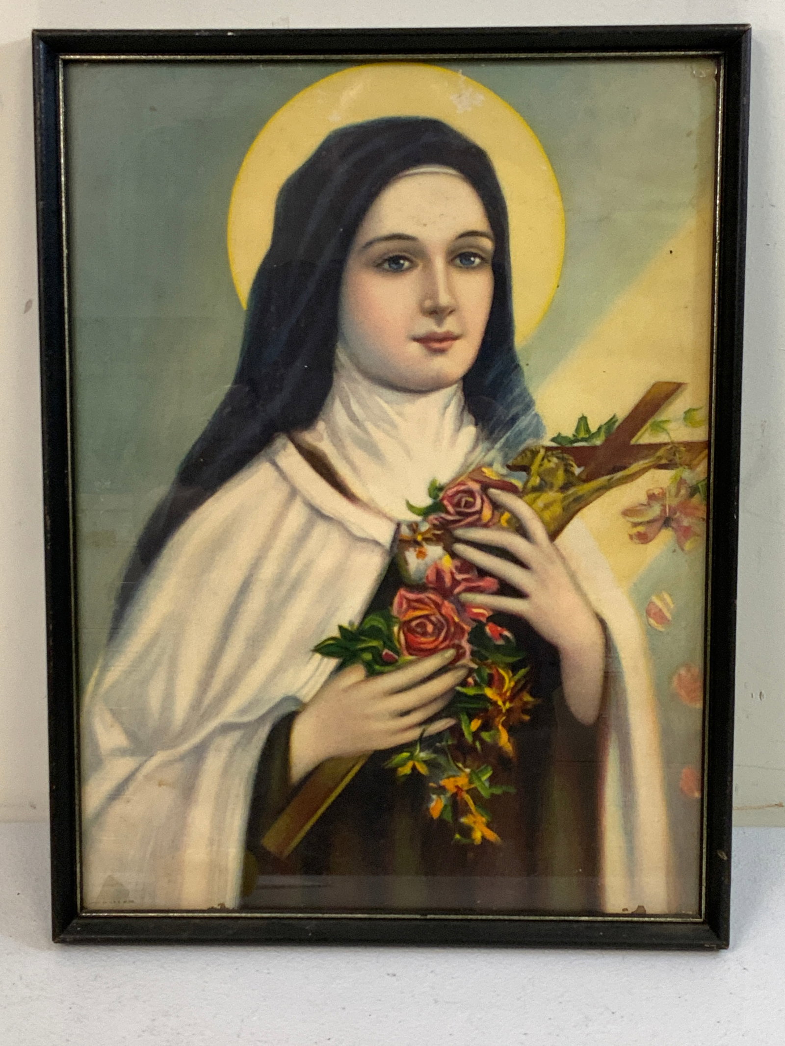 ANTIQUE CATHOLIC SAINT MARIE COLORED LITHOGRAPH: ANTIQUE CATHOLIC SAINT MARIE COLORED LITHOGRAPH. CIRCA 1920'S. PRINTED IN USA. FRAMED IN OLD FRAME 12 1/2 X 17 SIZE.