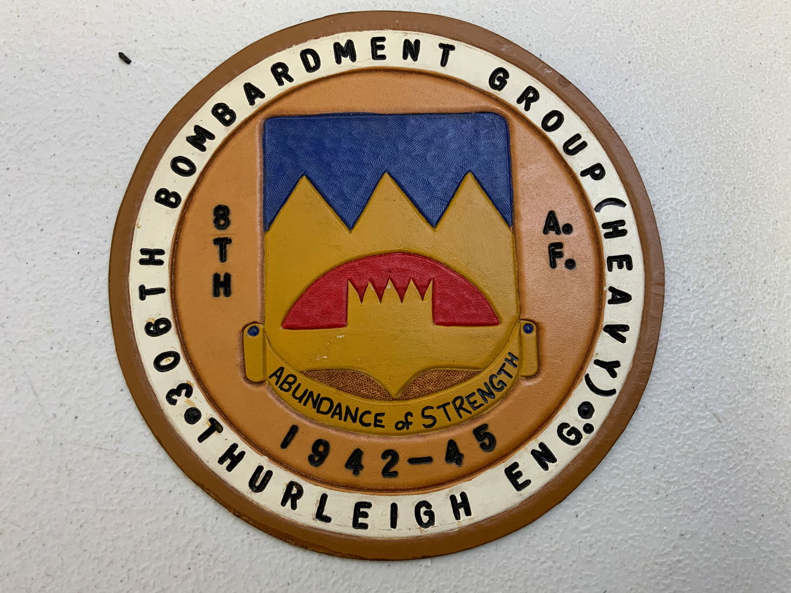 US WWII 8TH AIR FORCE 306th BOMBARDMENT GROUP LARGE LEATHER PATCH: US WWII 8TH AIR FORCE 306th BOMBARDMENT GROUP LARGE LEATHER PATCH. GREAT CONDITION. UNUSED. 6 1/2 DIAM. SIZE.