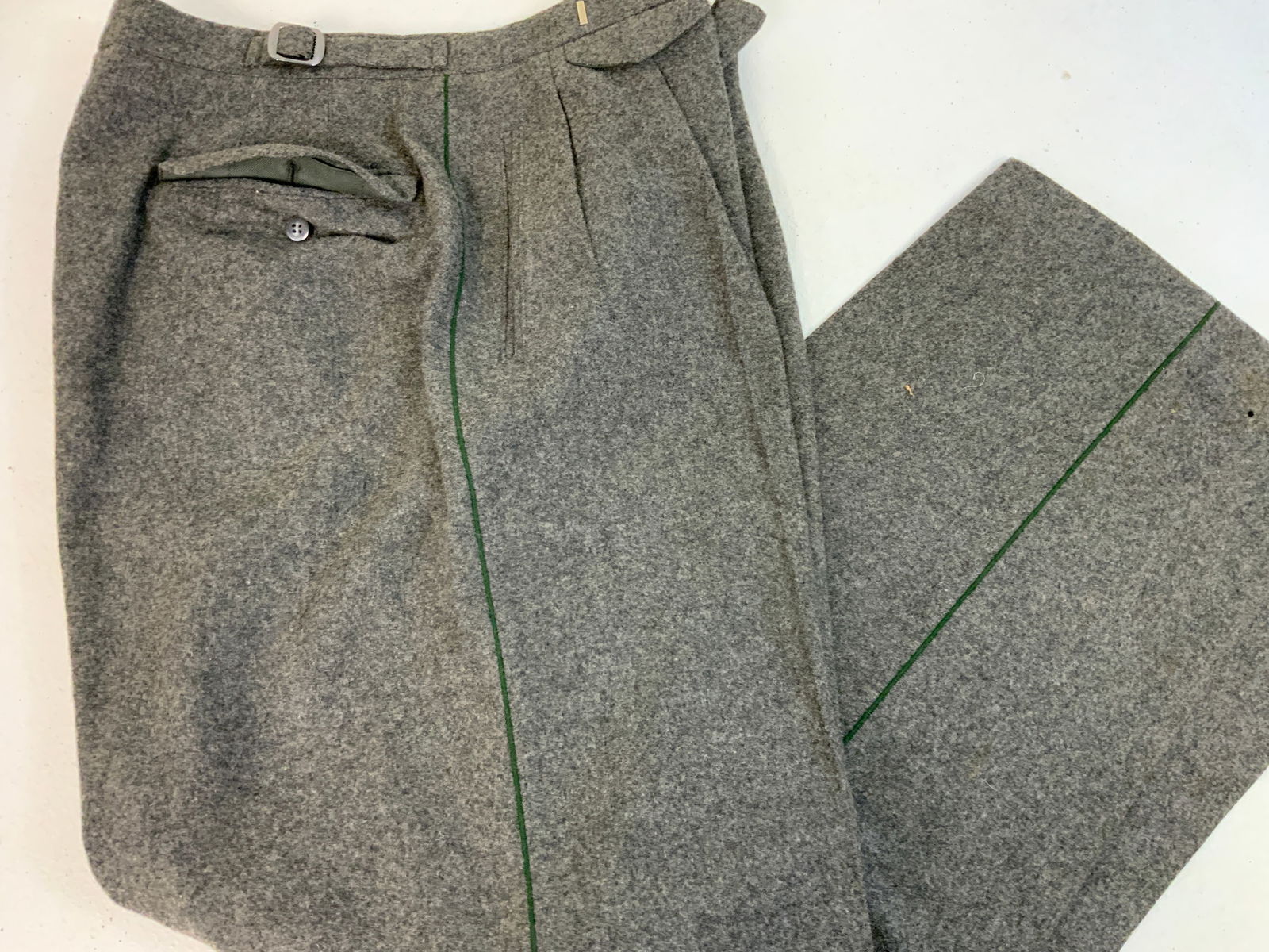 GERMAN FORESTRY SERVICE UNIFORM PANTS: GERMAN FORESTRY SERVICE UNIFORM PANTS. GREAY WOOL WITH GREEN PIPING. VERY GOOD CONDITION. APPROX. SIZE W36 L32 .