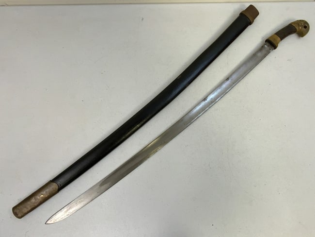 USSR RUSSIAN SOVIET CAVALRY SABER SWORD SHASHKA M1927: USSR RUSSIAN SOVIET CAVALRY SABER SWORD SHASHKA M1927. EARLY EXAMPLE DATED 1928. OVERALL GREAT CONDITION. MANY STAMPS .COMES WITH SCABBARD THAT MISSING CENTER FITTING.40" LONG WITH 32" LONG BLADE