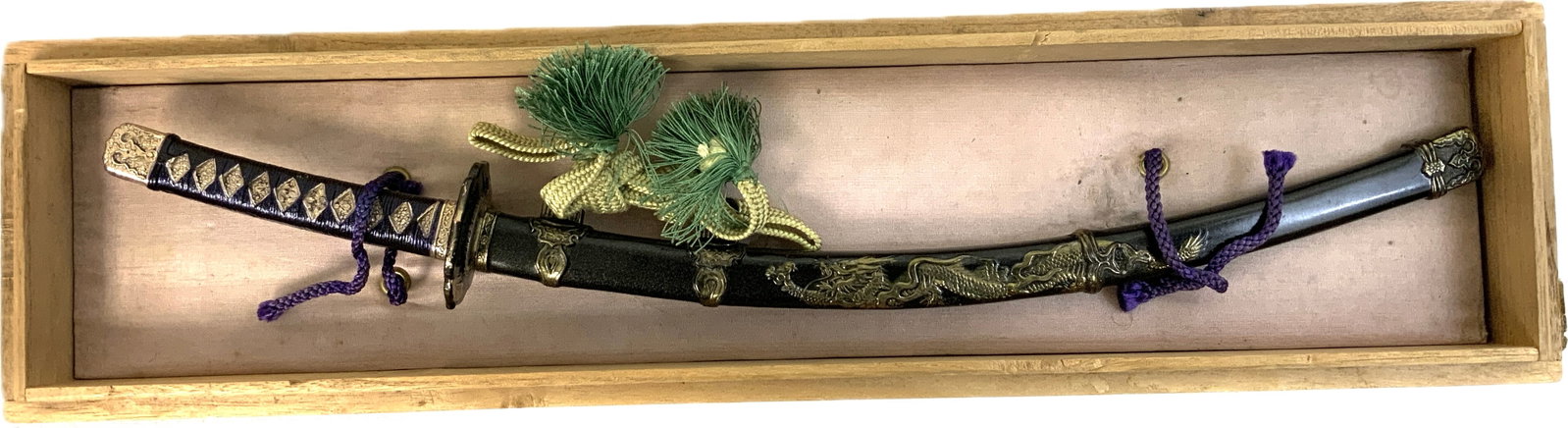 VINTAGE JAPANESE MINIATURE TACHI SAMURAI SWORD: VINTAGE JAPANESE MINIATURE TACHI SAMURAI SWORD. BEAUTIFUL PIECE. 13" LONG WITH 7 1/2" LONG BLADE. COMES WITH WOODEN DISPLAY 14 1/2" X 3 3/4" SIZE.