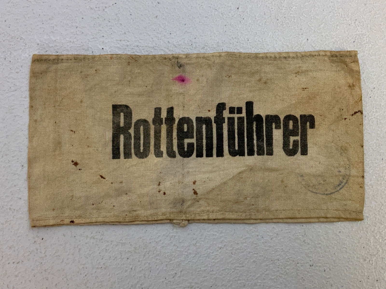 WWII GERMAN ROTTENFUHRER ARMBAND: WWII GERMAN ROTTENFUHRER ARMBAND. WELL USED. COTTON. INK STAMPED.