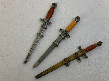 COLLECTION OF GERMAN MILITARY MINIATURE DAGGERS