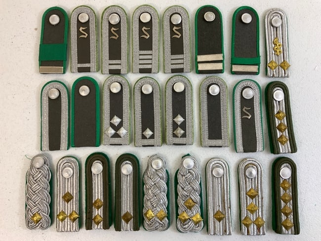 EAST GERMANY DDR LARGE LOT OF SHOULDER BOARDS: EAST GERMANY DDR LARGE LOT OF SHOULDER BOARDS. ALL SINGLES. ALL NEVER USED. GREAT TO BUILD A DISPLAY.