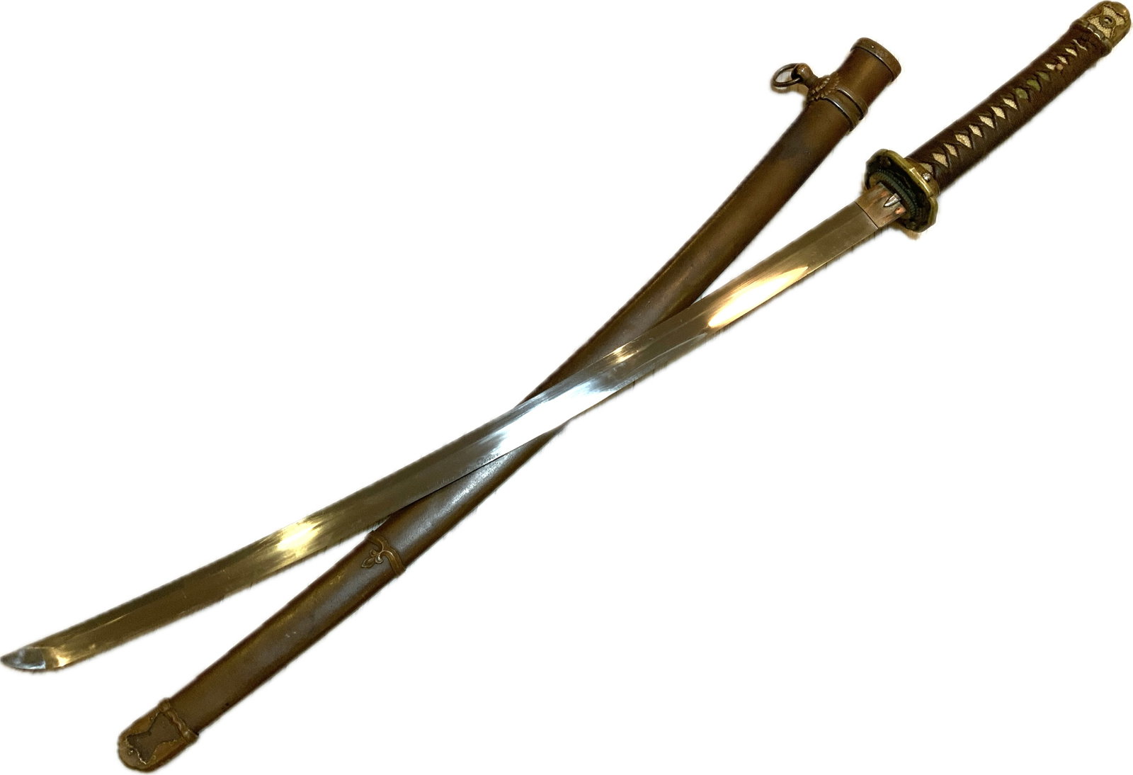 WWII IMPERIAL JAPAN JAPANESE ARMY OFFICER SAMURAI SWORD: WWII IMPERIAL JAPAN JAPANESE ARMY OFFICER SAMURAI SWORD . BEAUTIFUL BRIGHT BLADE IN GOOD POLISH STATE. NICE LONG SIGNATURE ON THE TANG AND IT HAS 2 MOUNTING HOLES AND USES BOTH HOLES. WWII FITTING WIT