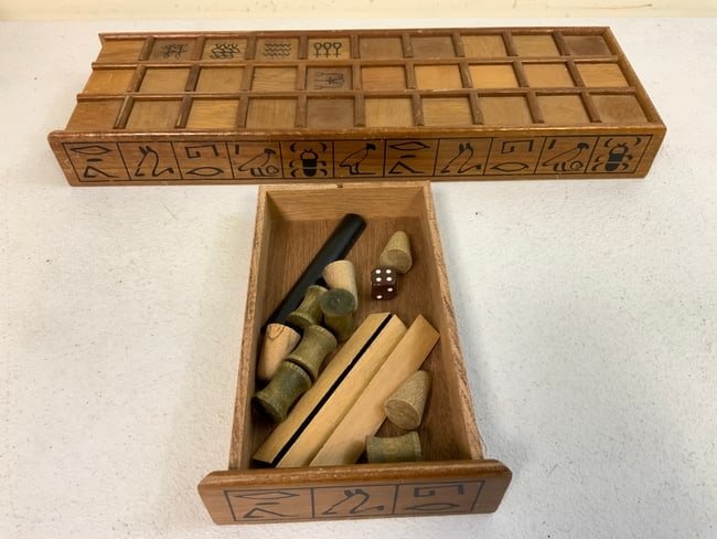 SENET ANCIENT EGYPTIAN WOODEN STRATEGY GAME: SENET ANCIENT EGYPTIAN WOODEN STRATEGY GAME. 16 1/2 X 5 1/2 SIZE. LOOKS TO BE COMPLETE AND IN GOOD CONDITION.FROM DR. PAUL D WYNN COLLECTION .