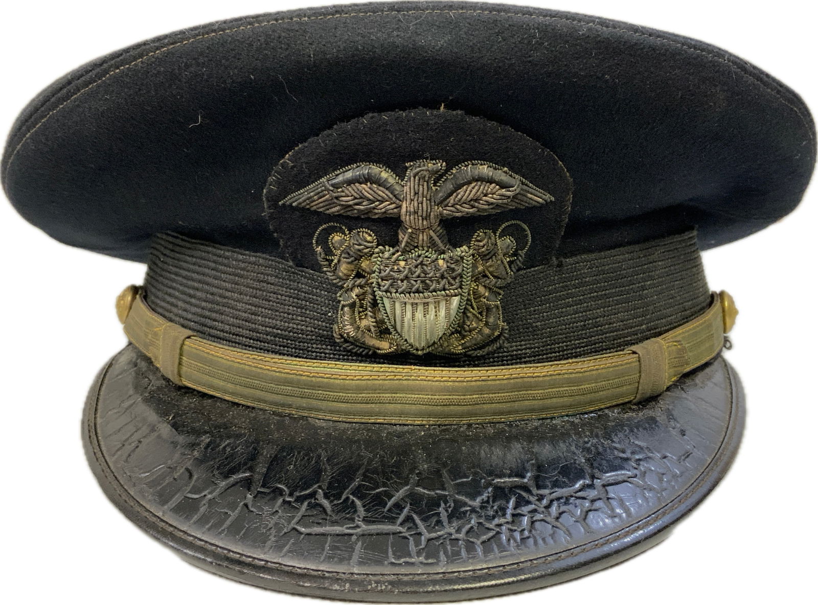 USA WWII US NAVY OFFICER NAMED VISOR HAT: WWII US NAVY OFFICER NAMED VISOR HAT. BLUE TOP. GOOD CONDITION.