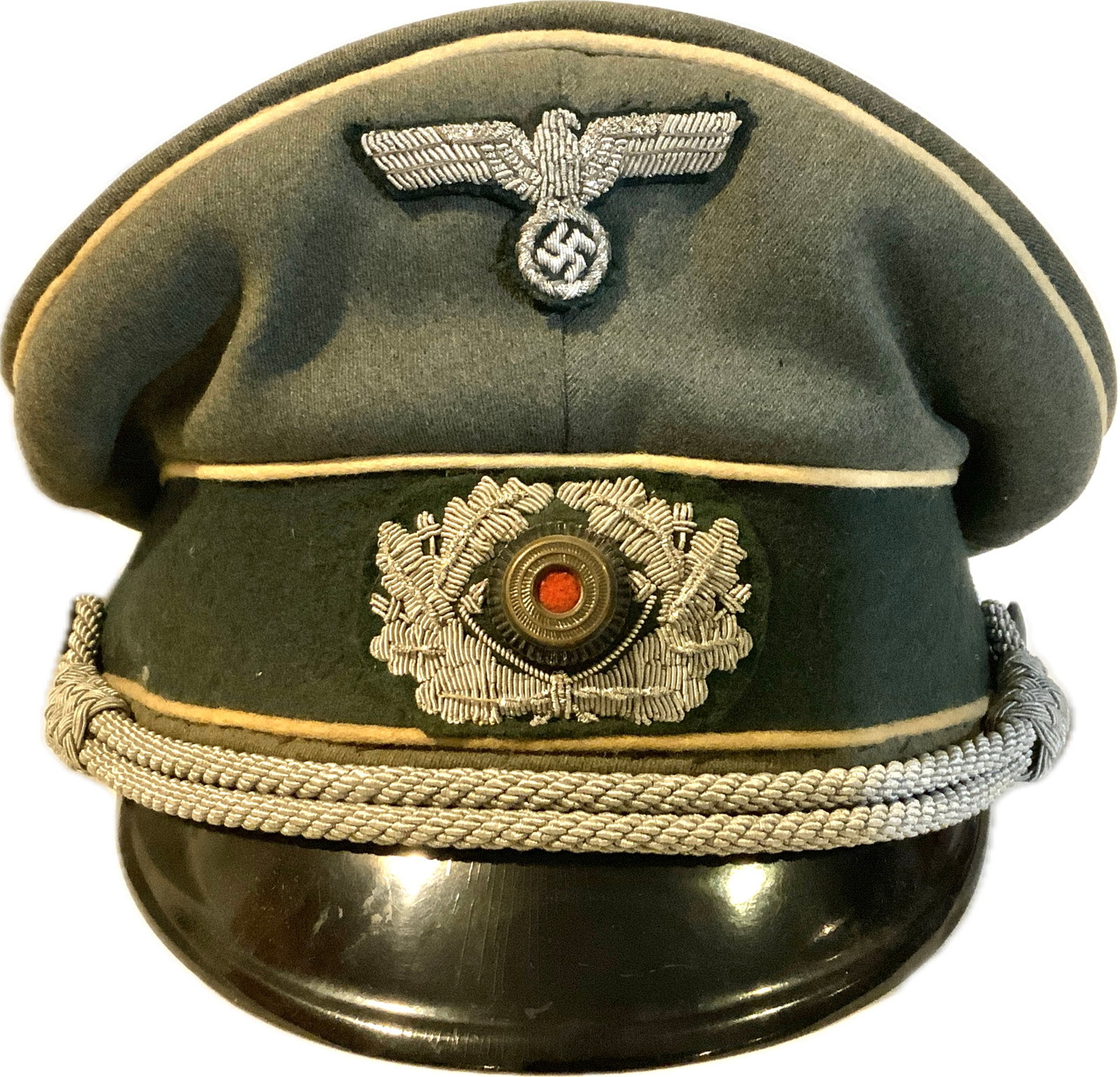 WWII GERMAN INFANTRY OFFICER VISOR CAP HAT: WWII GERMAN INFANTRY OFFICER VISOR CAP HAT. WELL WORN BUT STILL IN GOOD CONDITION FOR ITS AGE EXAMPLE WITH EMBROIDERED INSIGNIA. MAKER MARKED.SIZE AROUND 57.