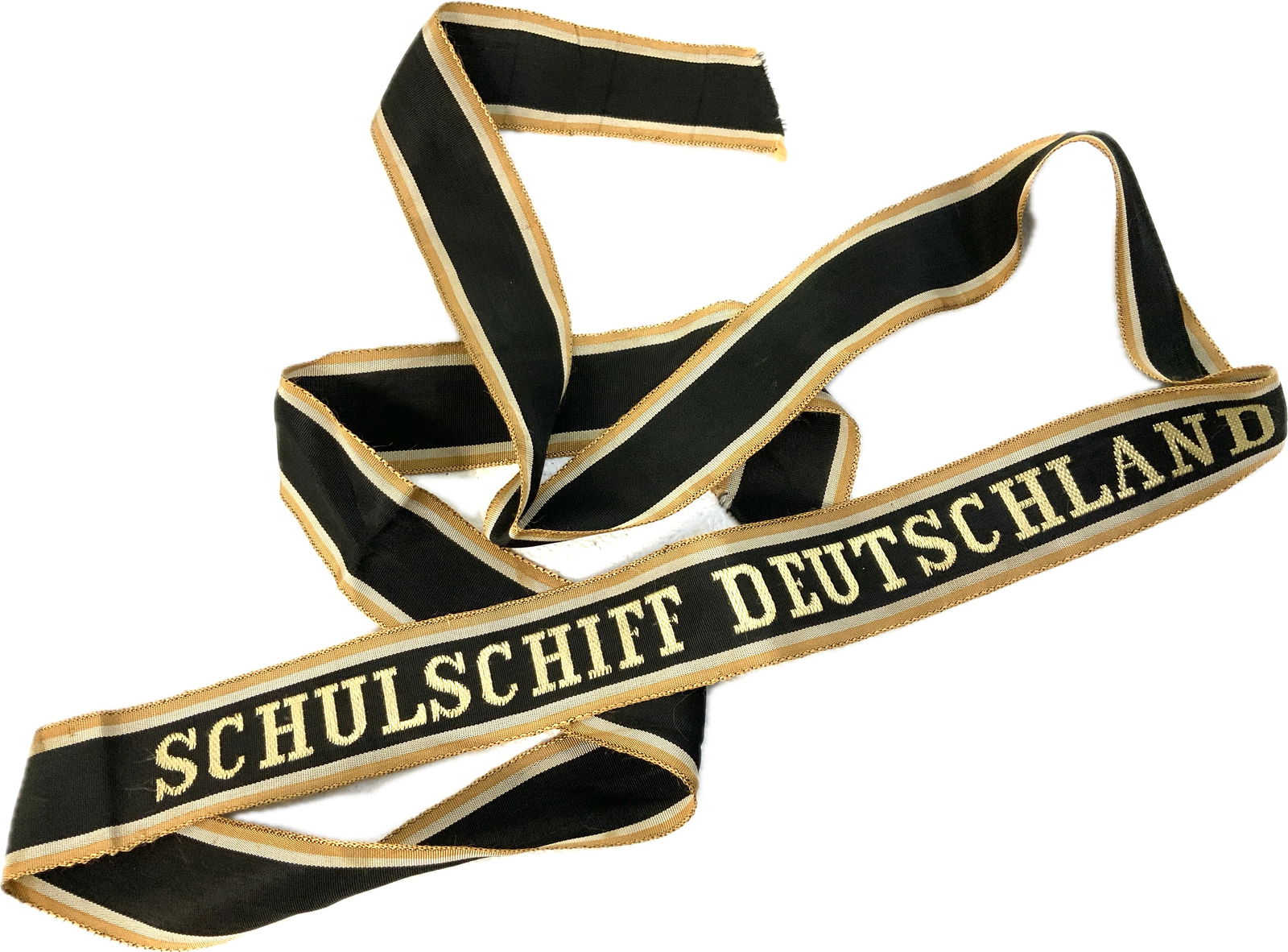 GERMAN NAVY SCHOOL TRAINING SHIP "SCHULSCHIFF DEUTSCHLAND" CAP TALLY: Schulschiff Deutschland (Training ship Germany/School ship Germany) is a German full-rigged sail training ship, maintained as a historical monument and museum ship. She was employed as a school ship f