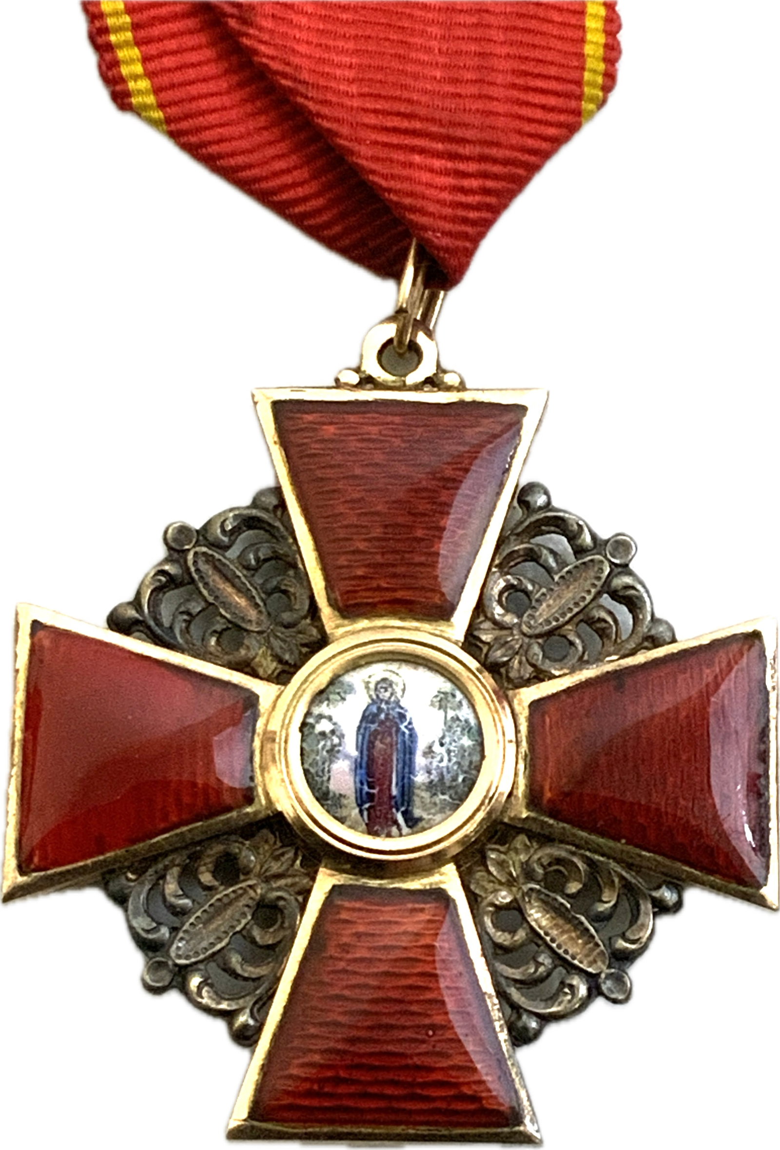 IMPERIAL RUSSIAN ORDER OF SAINT ANNA IN GOLD: IMPERIAL RUSSIAN ORDER OF SAINT ANNA IN GOLD. BEAUTIFUL ORDER IN 14K GOLD AND ENAMELS. GREAT OVERALL CONDITION FOR ITS AGE. ON ORIGINAL RIBBON. 8.2 GRM. WEIGHT.