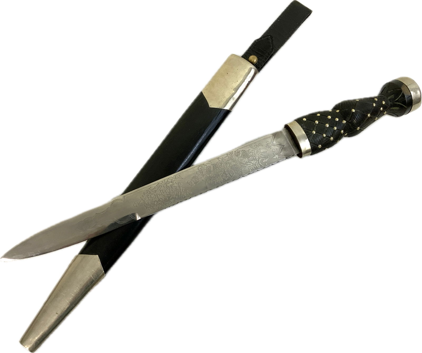 BONNY HIGHLAND SCOTTISH DIRK DAGGER WITH ETCHED BLADE: BONNY HIGHLAND SCOTTISH DIRK DAGGER WITH ETCHED BLADE. VERY NICE EXAMPLE. GOOD USED CONDITION. LEATHER BELT STRAP. NICE STRONG BLADE. 19" LONG WITH 11 1/2" LONG BLADE.