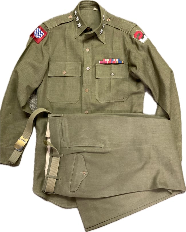 WWII US ARMY GENERAL UNIFORM SHIRT AND PANTS: WWII US ARMY GENERAL UNIFORM SHIRT AND PANTS. VERY GOOD CONDITION. 3 LARGE STAS TO THE COLLAR. COMPLETE WITH PATCHES AND AWARDS BAR. NO NAME INSIDE.