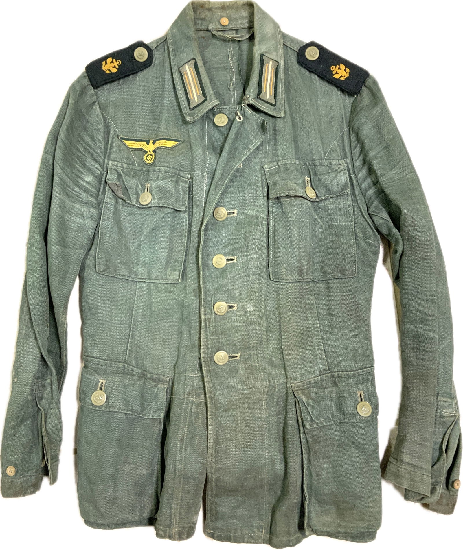 WWII GERMAN NAVY KRIEGSMARINE SUMMER UNIFORM COASTAL ARTILLERY TUNIC: WWII GERMAN NAVY KRIEGSMARINE SUMMER UNIFORM COASTAL ARTILLERY TUNIC . GREAT RARE WELL WORN EXAMPLE. COMPLETE WITH ALL INSIGNIA AND TAN COLOR PAINTED BUTTONS. INK STAMPED INSIDE.